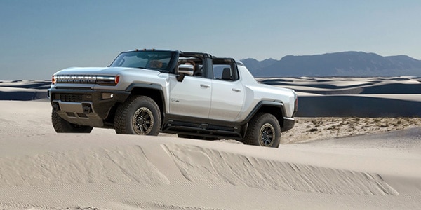 2022 GMC HUMMER EV on sand dunes