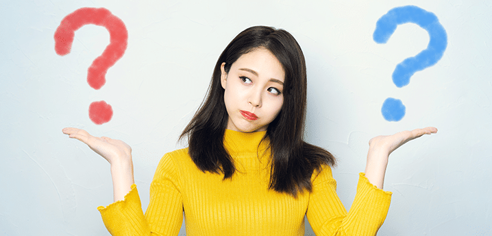 Young woman in a yellow sweater with shoulder shrugged and two question marks on both sides of her head |Fixed Vs. Variable Interest Rates