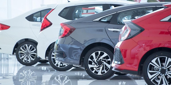 Shiny new cars lined up in a row