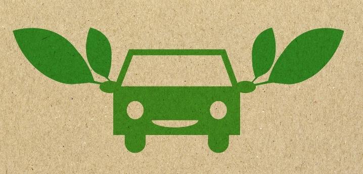 Graphic of a car with leaves coming off the mirrors to signify that it is eco-friendly