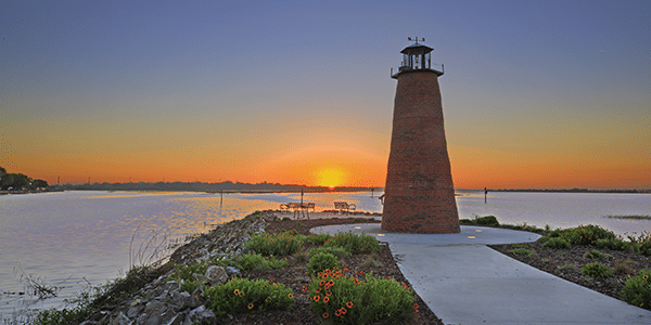 Lighthouse at sunset in Kissimmee, Florida | Cities With the Best and Worst Interest Rates
