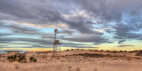 Windmill in the desert in Odessa, TX | Cities with the Best and Worst Interest Rates
