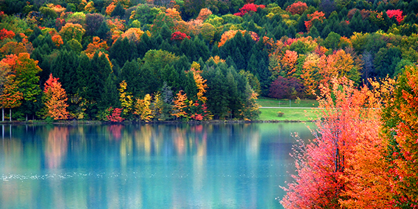 Fall leaves changing color around a Pennsylvania lake| States Best and Worst Auto Refinance Rates 