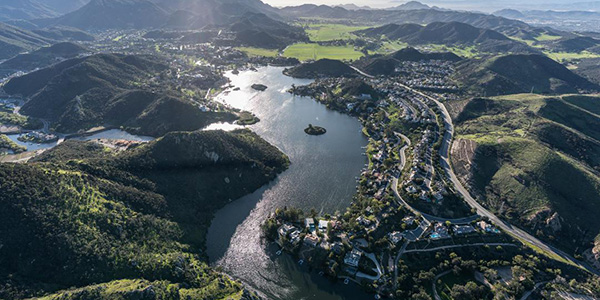 Aerial view of waterway and mountain range in California