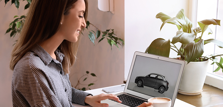 buying a car online on laptop