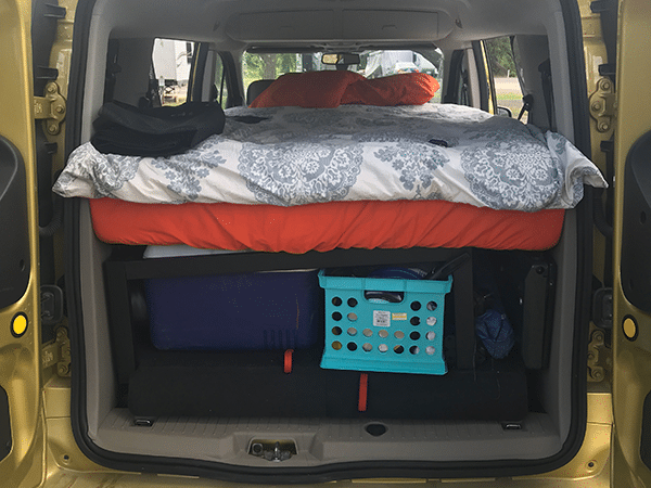 Minimalist set up of a van camper | Can You Road Trip While Working Remote?