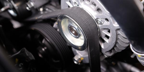 Close-up of an engine belt on a car motor