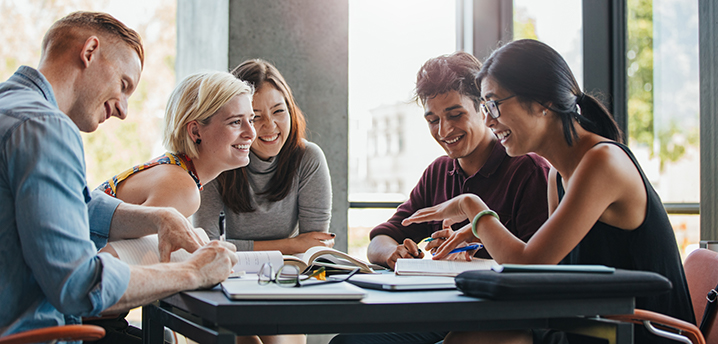 college students studying personal finance together