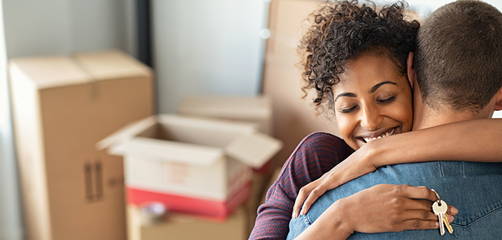 happy couple in new home - can you get a mortgage with a car loan