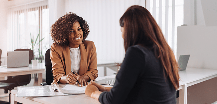 credit union banker helping customer with auto loan