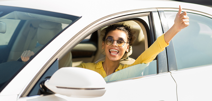 woman thumbs up car titles