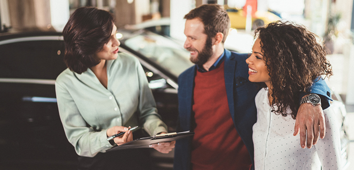 Couple evaluating joint vs cosigned auto loan options