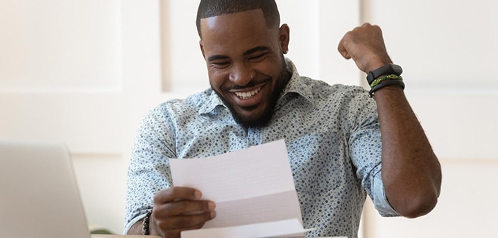 man happy with approval letter