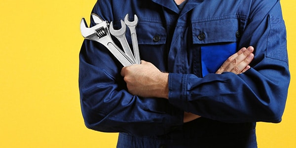 mechanic holding tools