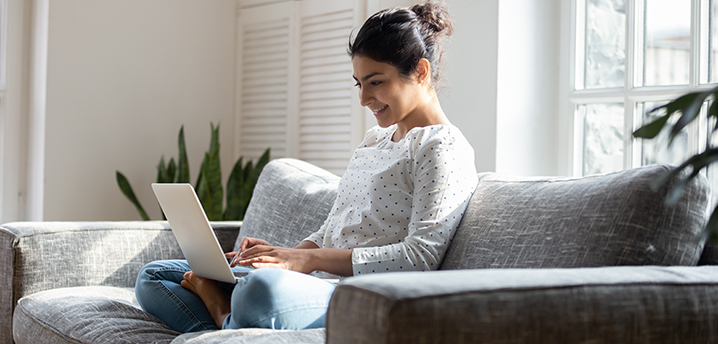 woman deciding between paying off student loans or car loan first