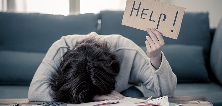 woman needing help deciding which loans to pay off first